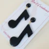 Bow & Crossbones Dolly Music Note Earrings - Black Accessories